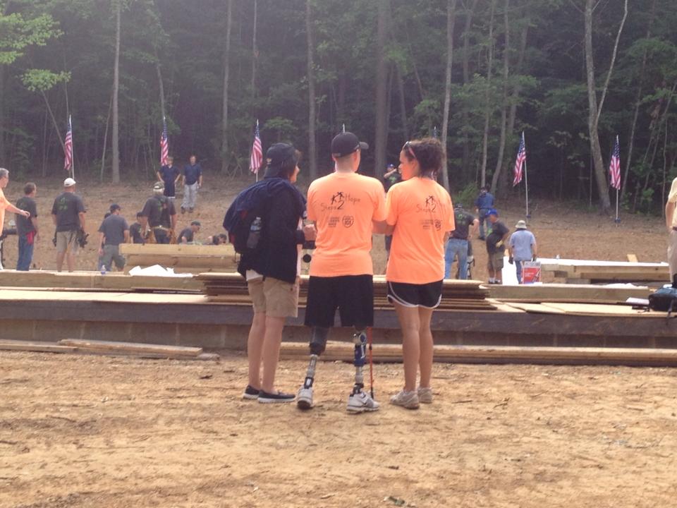 Team Andrew members standing and discussing